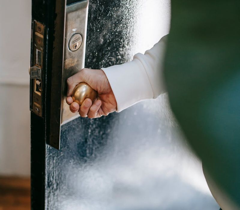 A welcoming doorway with light shining through, symbolizing a new beginning.