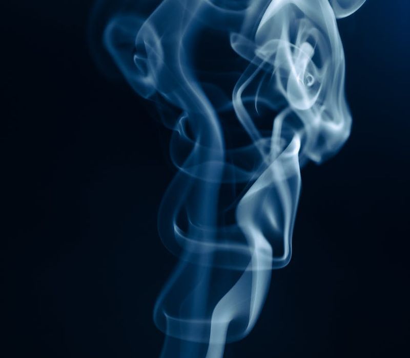 Abstract visual of gentle airflow representing breathing techniques.