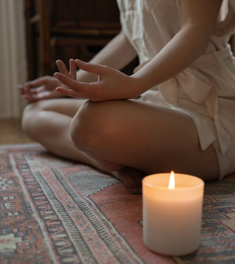 Woman in a calm yoga pose, embodying focus and serenity.